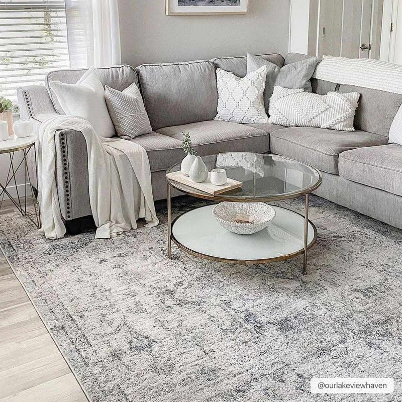 Hauteloom Orrick area rug with intricate geometric patterns in neutral tones, perfect for modern living spaces.