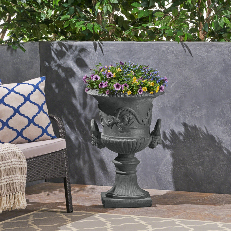 Black Roman MGO garden urn planter with classic design, durable magnesium oxide material, suitable for outdoor garden decor.