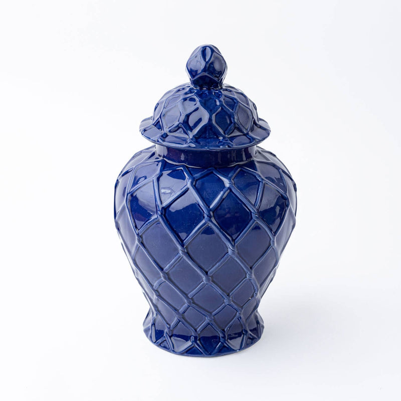 Three navy textured ginger jars of different sizes, showcasing their detailed surface and elegant design.