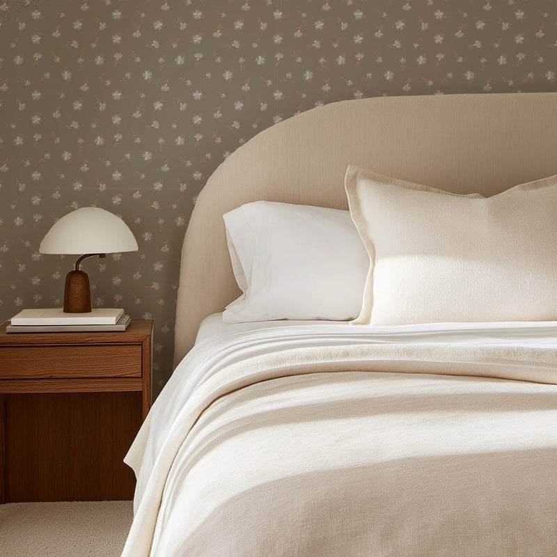 Vintage Daisies wallpaper by North and Finch featuring a classic floral pattern with white daisies on a soft background.
