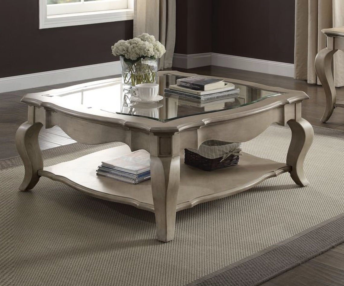 Chelmsford clear glass coffee table with beveled top and shelf, featuring taupe accents, by HouseOfZazla.