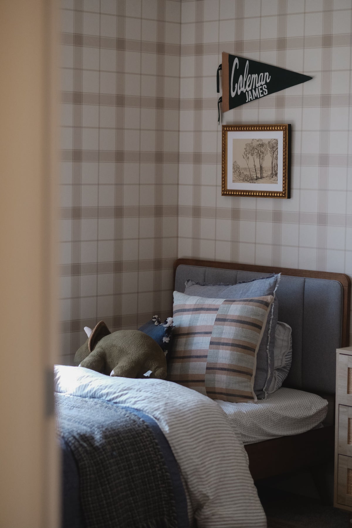 North and Finch Henry Plaid wallpaper featuring a classic plaid pattern in neutral tones for stylish wall decor.