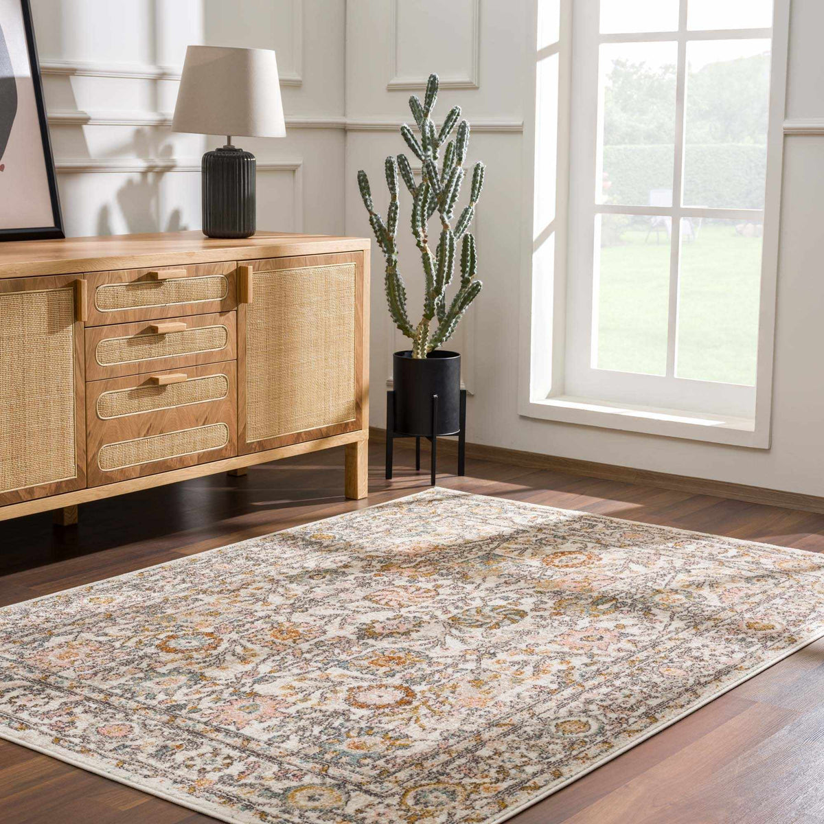 Herstmonceux area rug by Boutique Rugs displayed in a cozy living room setting with neutral tones and intricate pattern details.