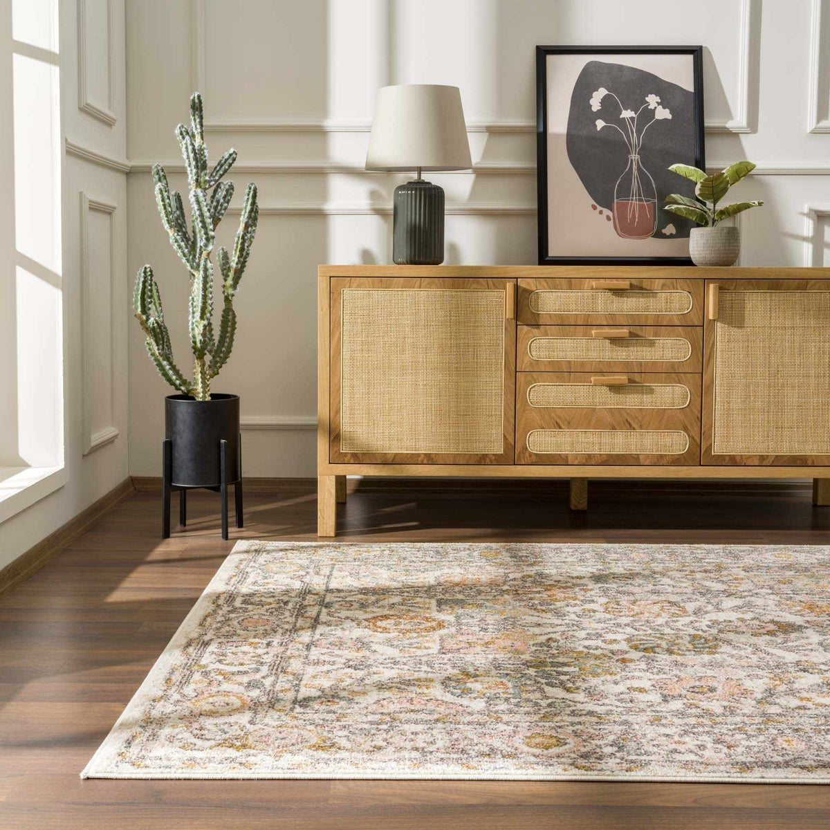 Herstmonceux area rug by Boutique Rugs displayed in a cozy living room setting with intricate patterns and warm tones.
