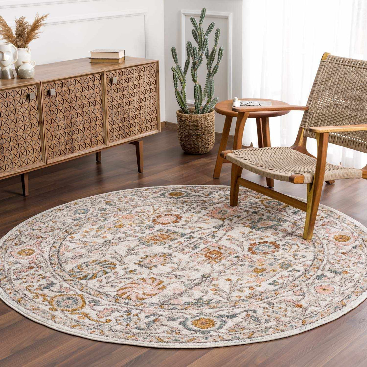 Herstmonceux area rug from Boutique Rugs featuring a vibrant red and beige geometric pattern in a cozy room setting