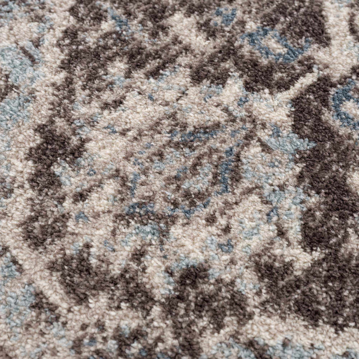 Hauteloom Peeta dark brown medallion area rug with intricate pattern, textured surface, suitable for living rooms or bedrooms.