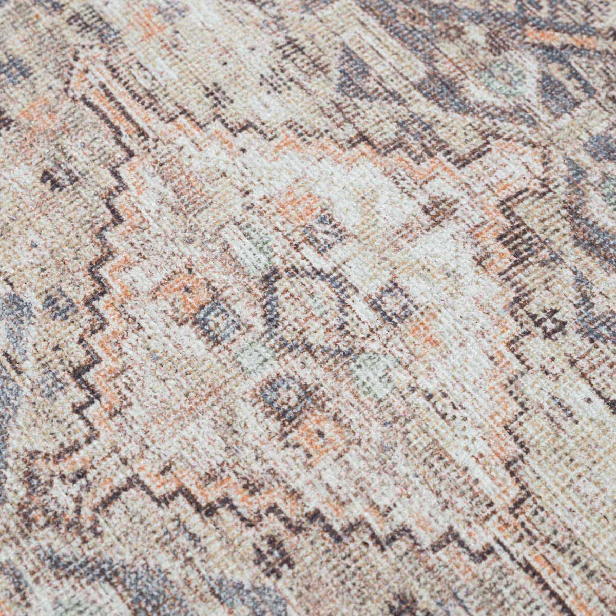 Tan washable area rug from Boutique Rugs featuring a textured design, perfect for living spaces and easy to clean.