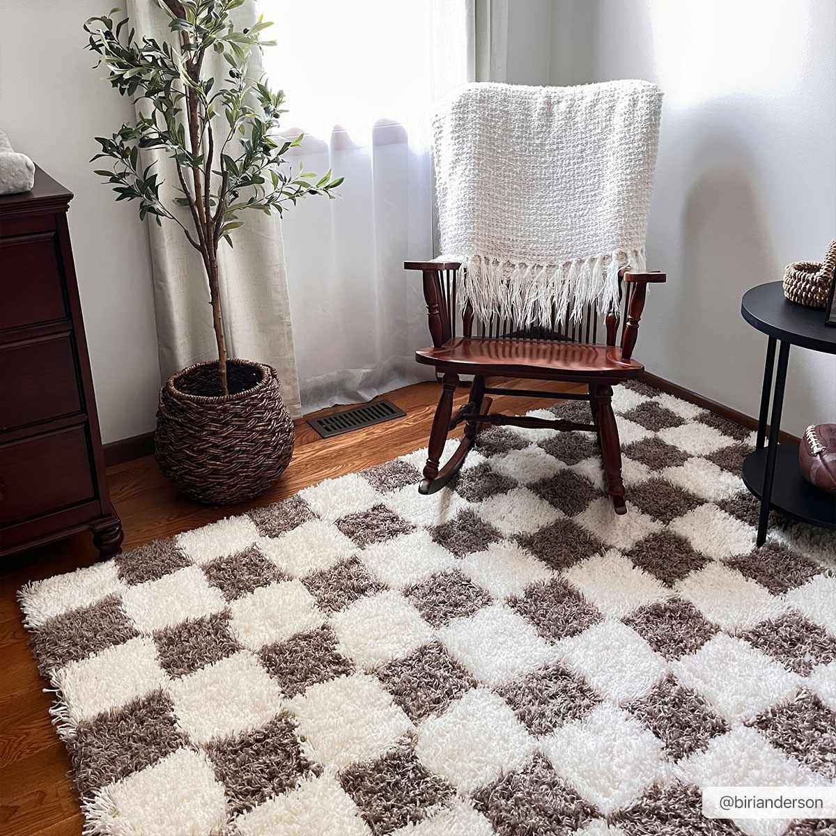 Brown checkered area rug by Boutique Rugs, showcasing a stylish geometric pattern in a 6.7x9.6 ft size.