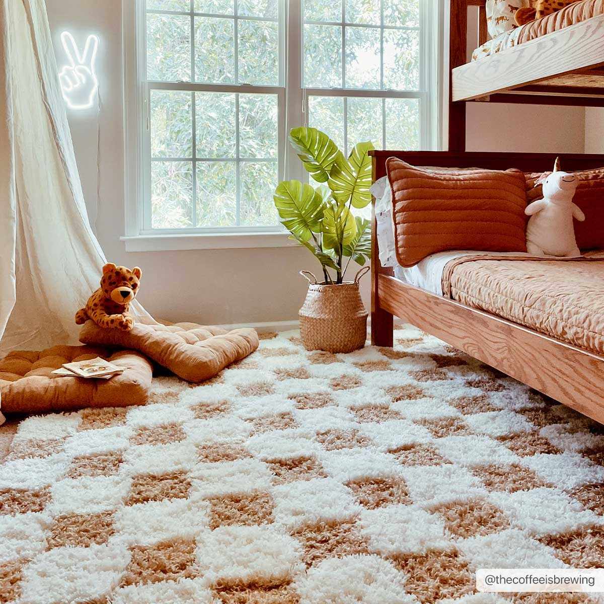 Boutique Rugs Atira Mustard Checkered Area Rug, 6x9 feet, with a vibrant yellow and white checkered pattern on a cozy living room floor
