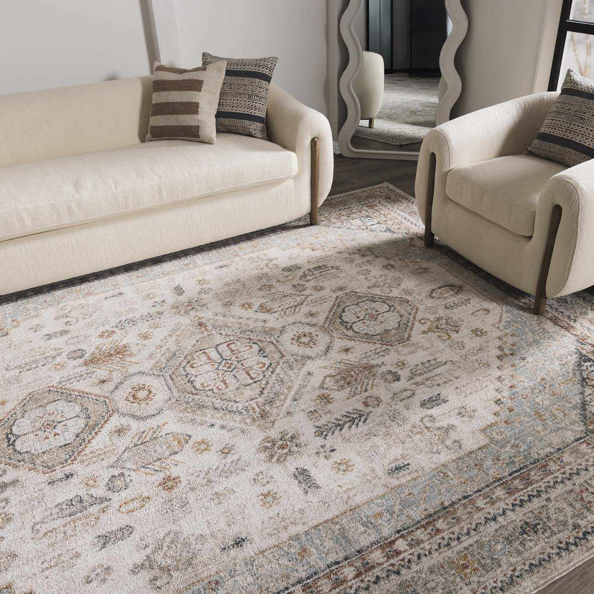 Kouta Cream Area Rug by Boutique Rugs in a cozy living room with neutral tones and textured pattern, showcasing its soft, plush surface.