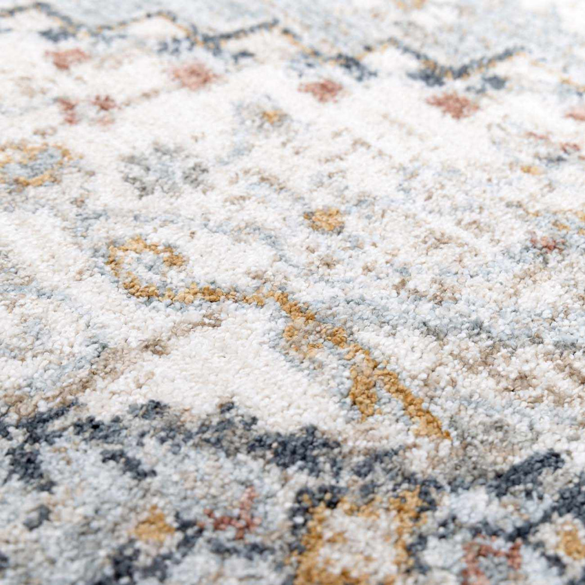 Gray and blue area rug with textured pattern from Boutique Rugs, showcasing a soft, woven surface in a modern design.