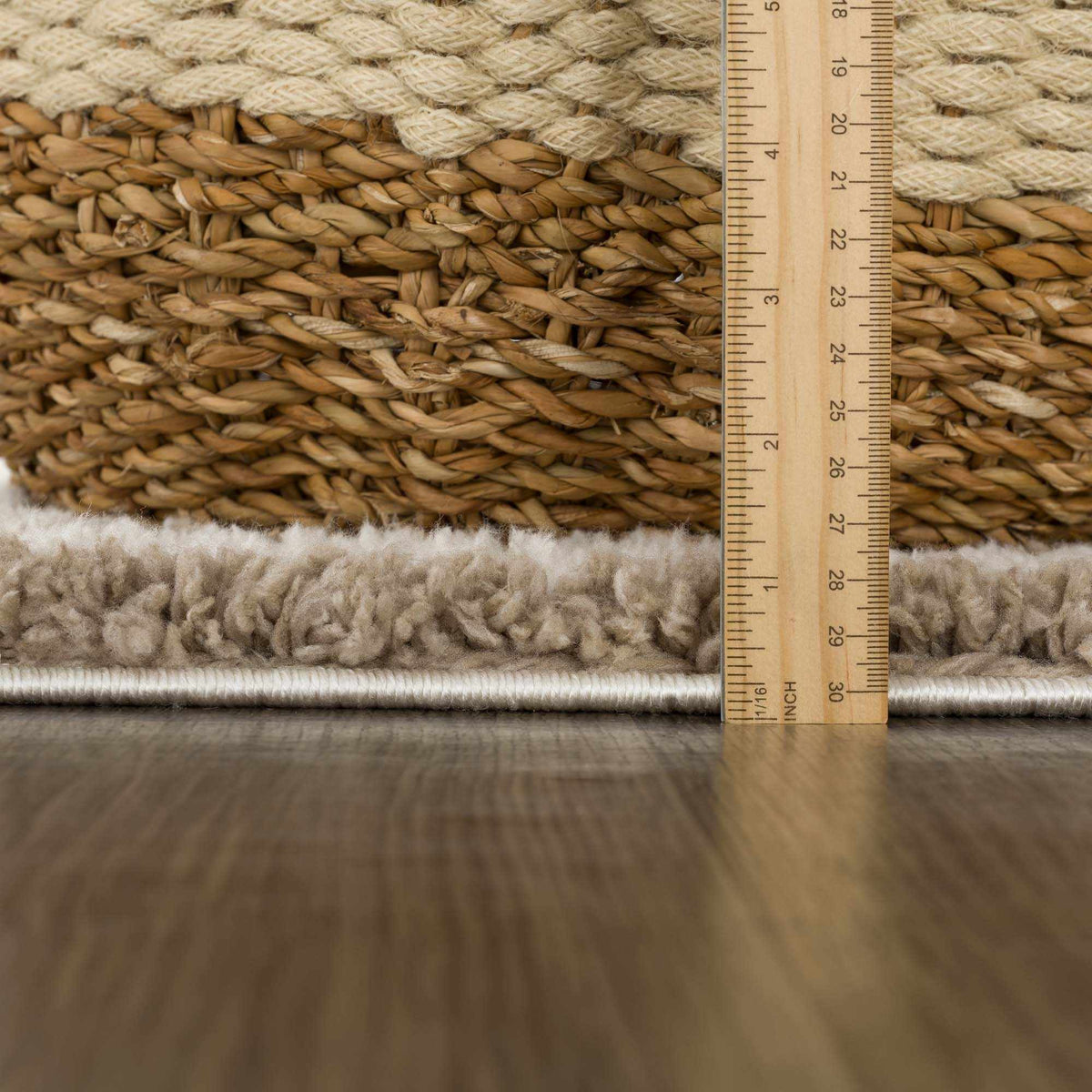 Beige Jola area rug by Boutique Rugs with textured pile, shown in a cozy interior setting.