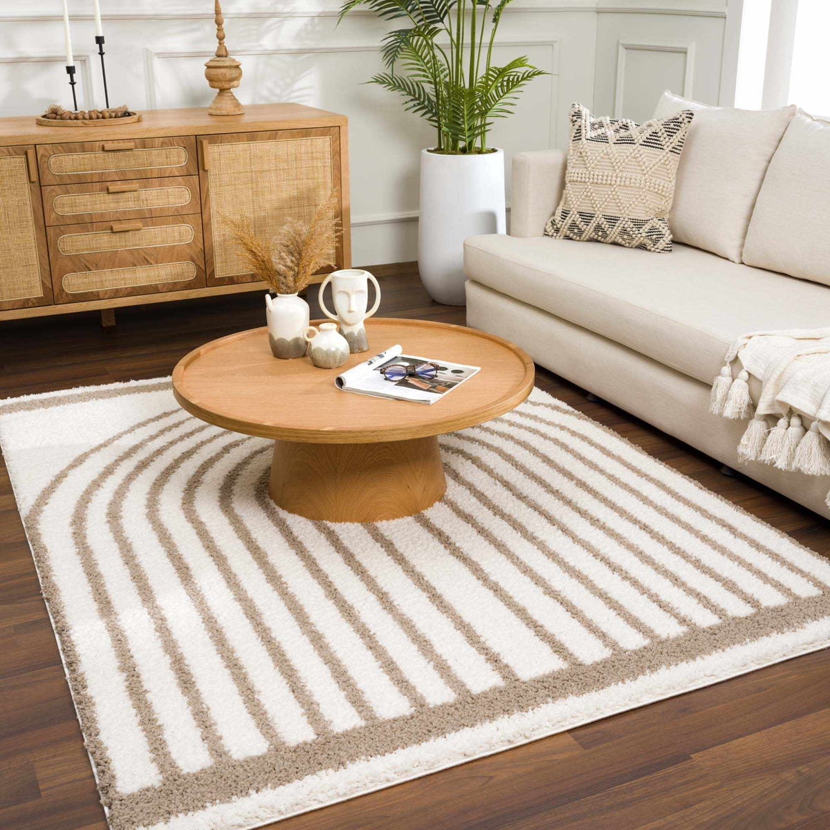 Jola beige area rug by Boutique Rugs displayed in a room scene, showcasing soft woven texture and neutral color for living space décor.