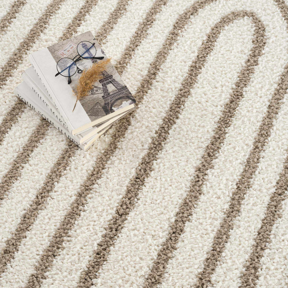Jola beige area rug from Boutique Rugs, featuring soft woven texture and neutral tones, displayed in a stylish interior setting.