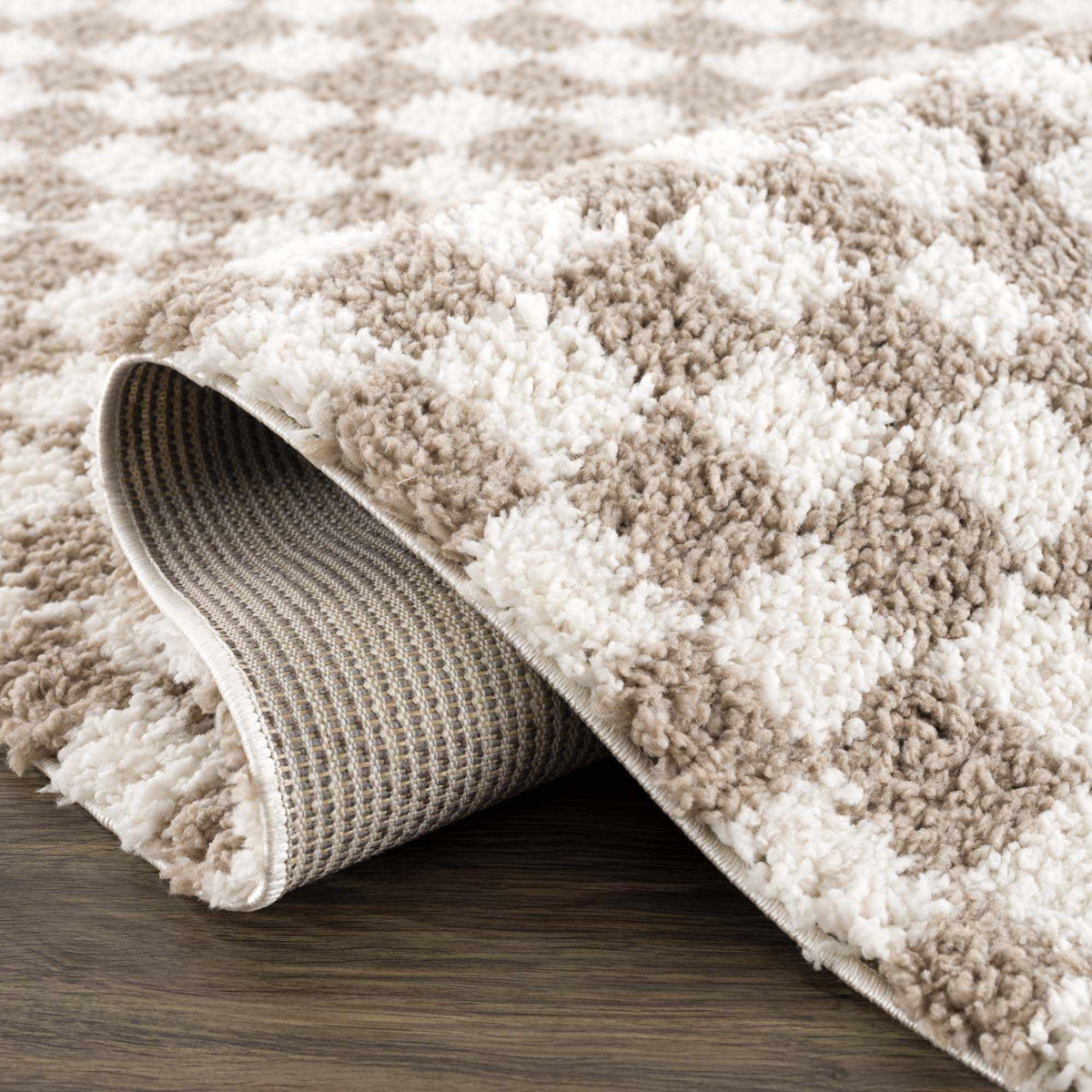 Taupe checkered shag rug from Boutique Rugs, showcasing soft, plush pile and modern geometric pattern in a cozy interior setting.