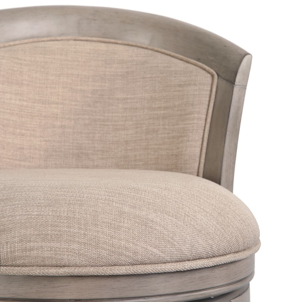 Close-up of Carolina Barstool Kitty Hawk swivel stool in Uptown Grey and beige fabric, showing its plush upholstery and swivel base.