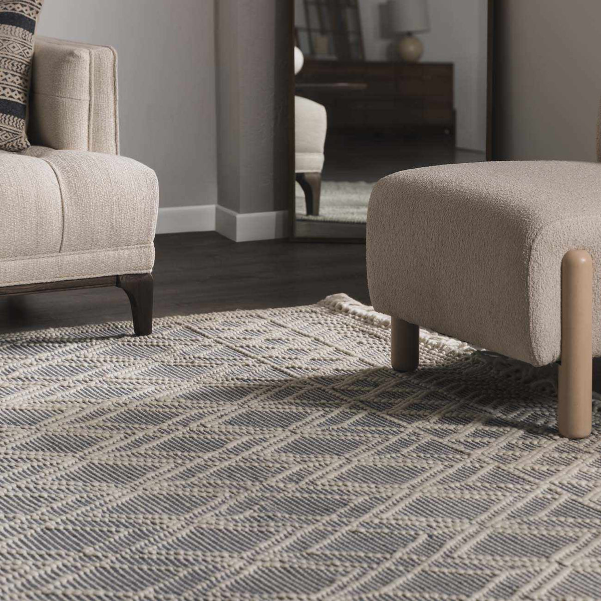 Blue Wool Rug from Ramsbury Denim collection by Boutique Rugs, shown in a cozy room scene with textured wool fibers and stylish design.