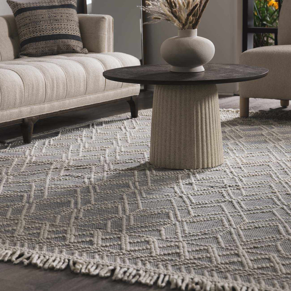 Blue wool rug from Ramsbury Denim collection by Boutique Rugs, shown in a cozy living room setting.
