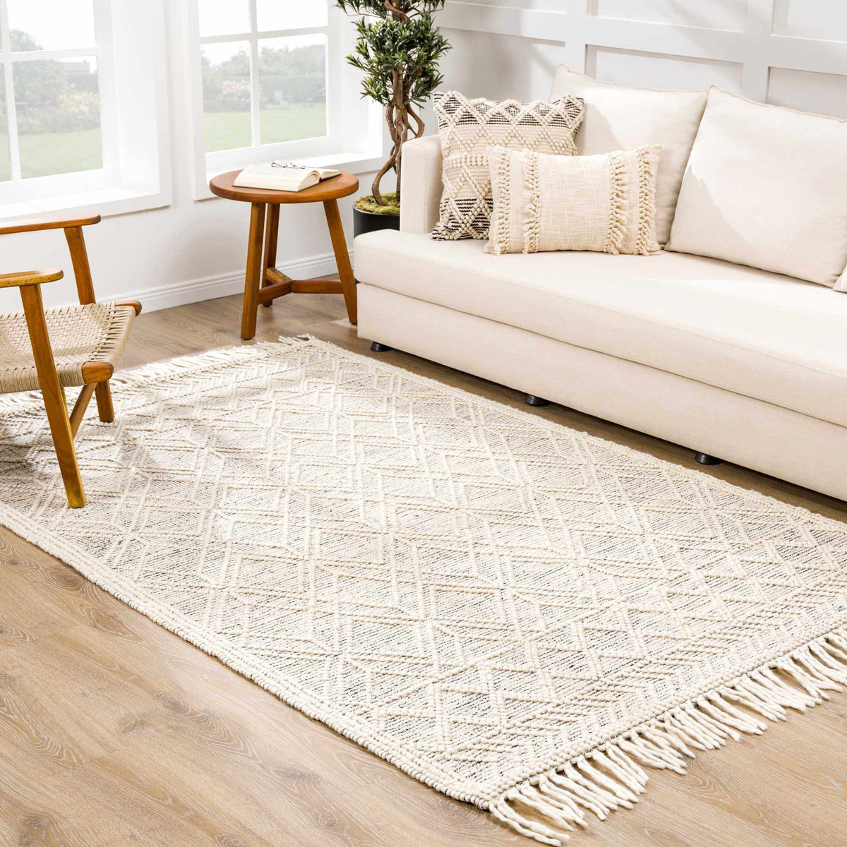 Hauteloom Ramsbury area rug in a cozy room scene, featuring a soft, patterned design in neutral tones.