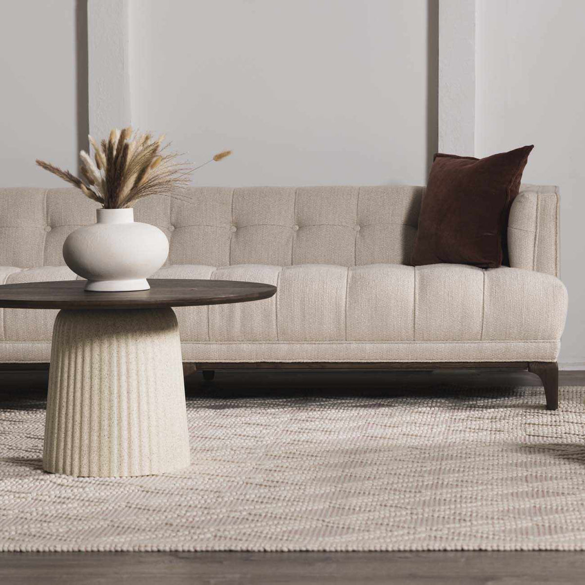 Soft pink wool rug from Boutique Rugs in a cozy room setting, showcasing plush texture and elegant design.