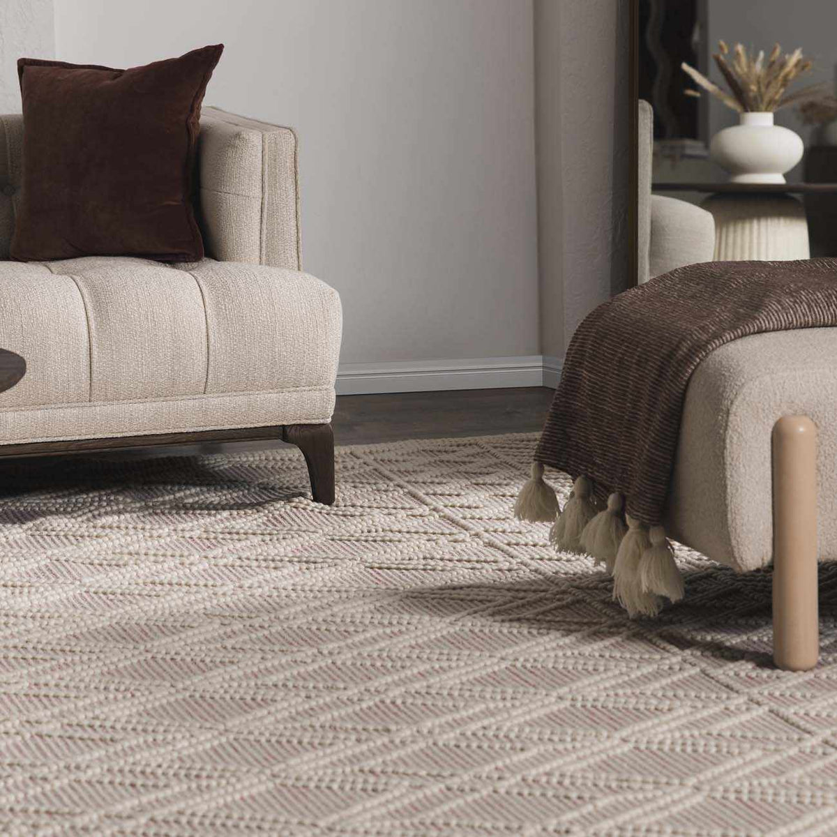 Soft pink wool rug by Boutique Rugs in a cozy room setting, showcasing plush texture and elegant design.