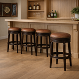 Backless Carolina Barstool in caramel with a swivel seat, shown in a modern living room setting.