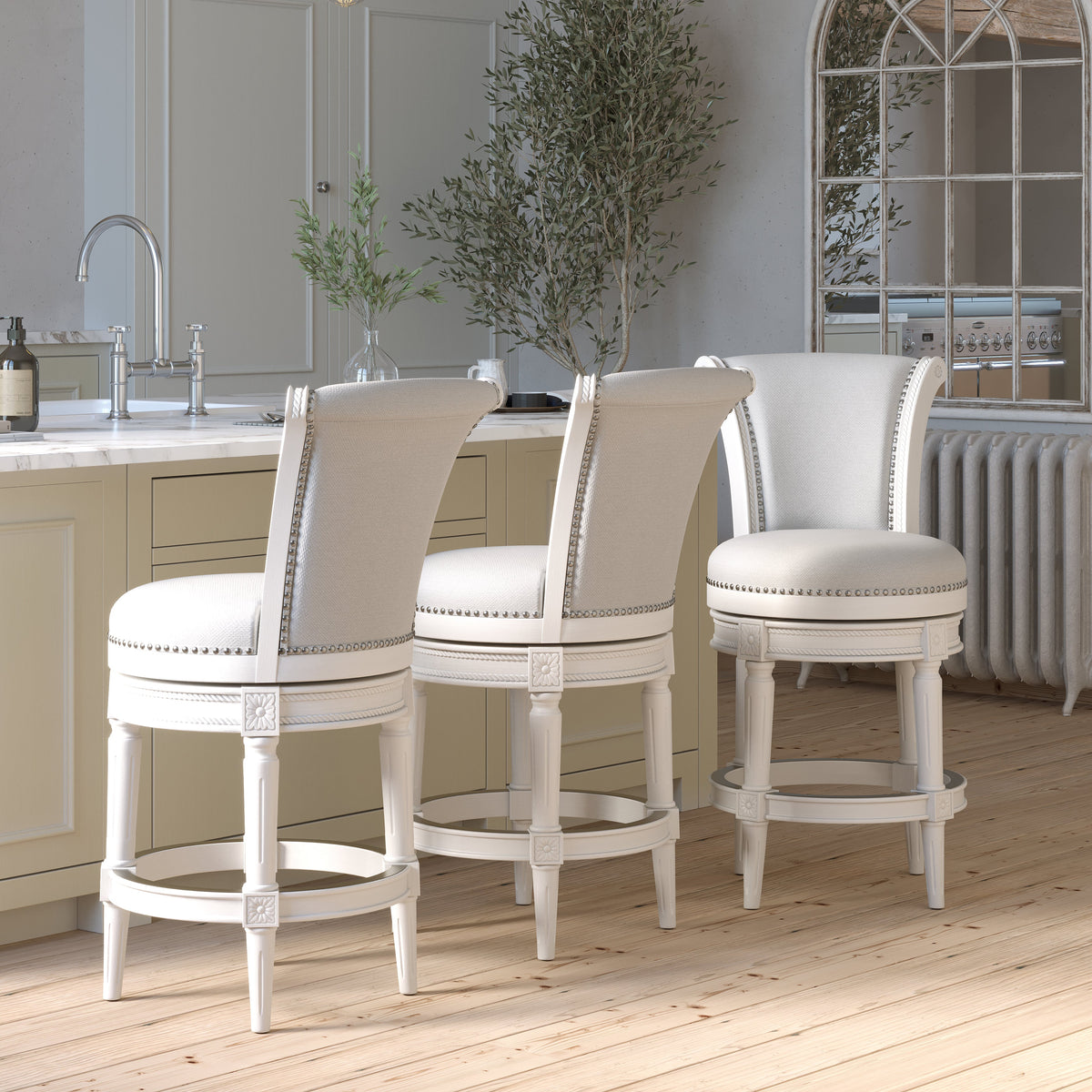Charlotte swivel barstool by Carolina Barstool with white wood frame and grey fabric seat, suitable for kitchen or bar area.