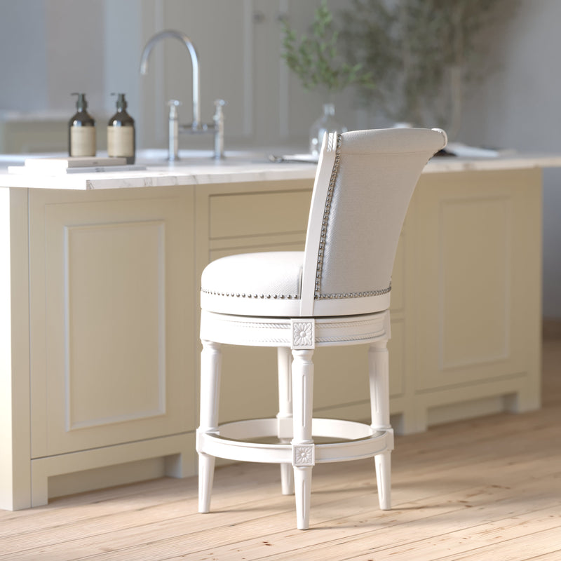 Charlotte swivel barstool by Carolina Barstool with white wood frame and grey fabric seat, suitable for kitchen or bar area.