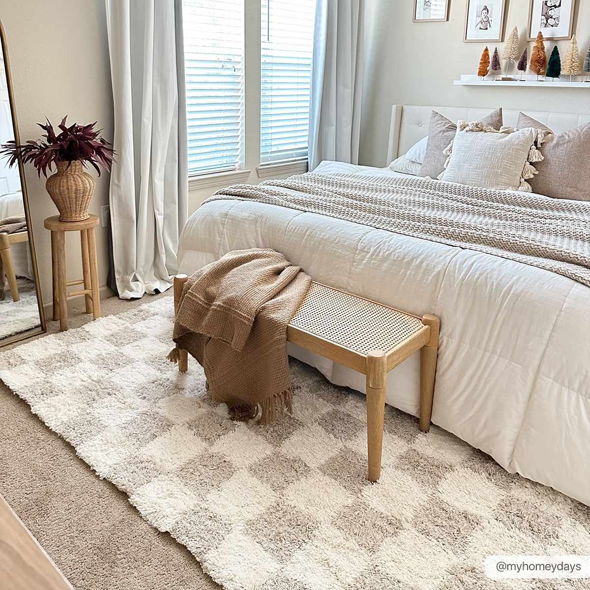 Light brown checkered area rug from Boutique Rugs, 7x10 size, with cream accents, showcasing a cozy and stylish home decor piece.