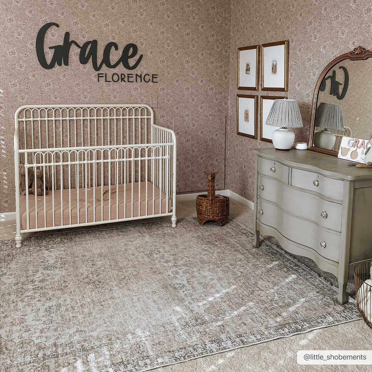 Cream washable area rug from Hauteloom Holi-2301 collection, 6.7x9 feet, with soft, plush texture and decorative pattern.