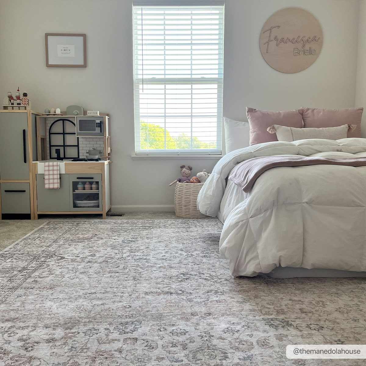 Cream washable area rug by Hauteloom, 8x10 size, with a soft, plush texture and decorative pattern for living room or bedroom.