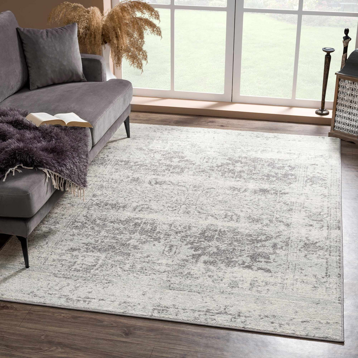 Hauteloom New Rachel area rug with a modern geometric pattern in neutral tones, perfect for living room or bedroom decor.