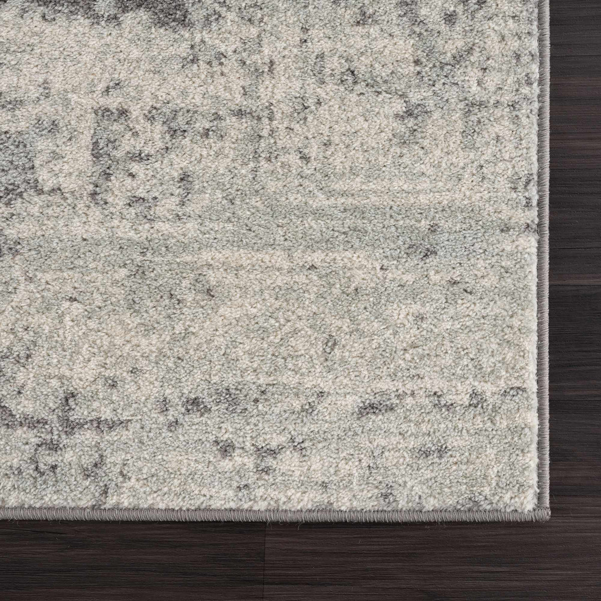 Hauteloom Rachel area rug featuring a modern geometric pattern in neutral tones, perfect for contemporary home decor.