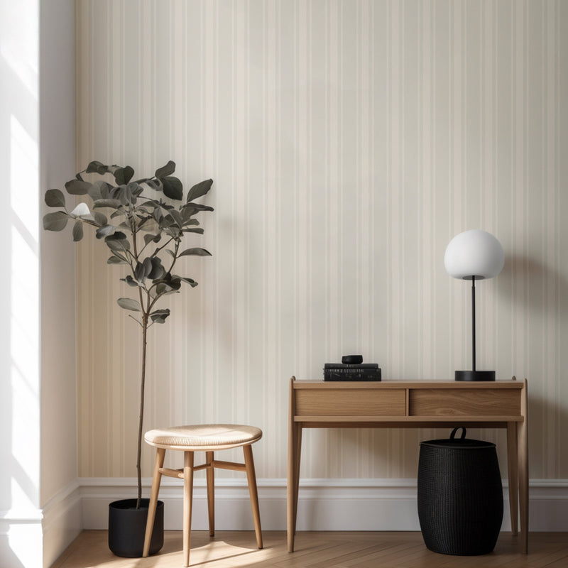 North and Finch Ezra Stripe wallpaper shown in a stylish living room with bold striped pattern on the wall.