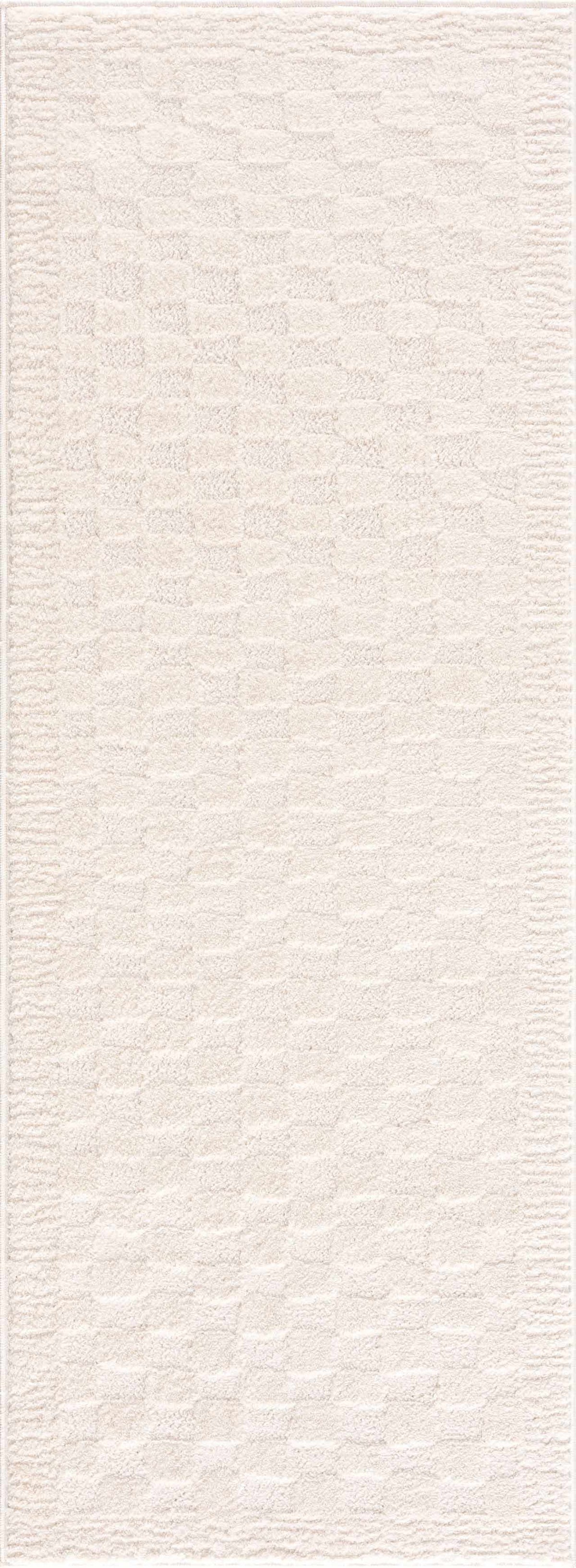 Ivory checkered area rug by Boutique Rugs featuring a geometric pattern, displayed on a neutral floor in a stylish interior setting.