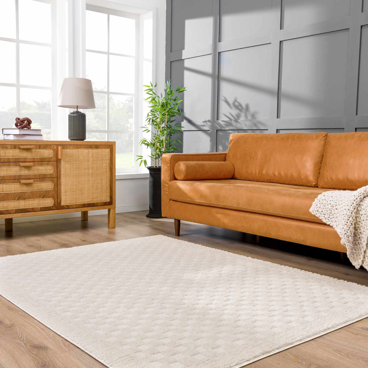 Leryn Ivory Checkered Area Rug by Boutique Rugs, beige and cream checkered pattern in a cozy living room setting