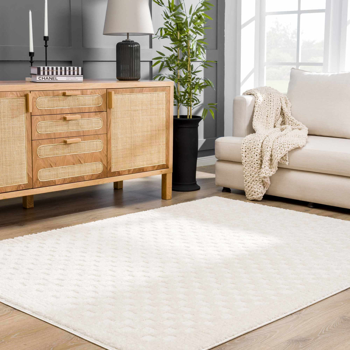 Ivory checkered area rug by Boutique Rugs, showcasing a stylish geometric pattern in a modern room setting.