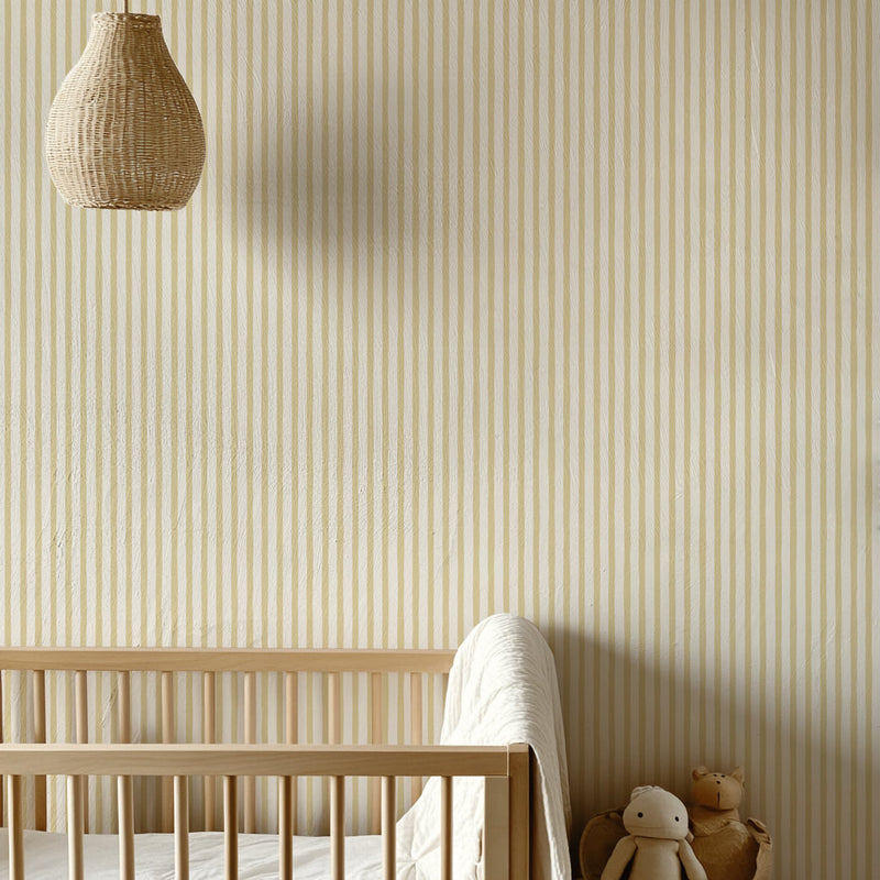 Yellow Finn Stripe wallpaper by North and Finch featuring bold horizontal stripes, perfect for modern interior walls.