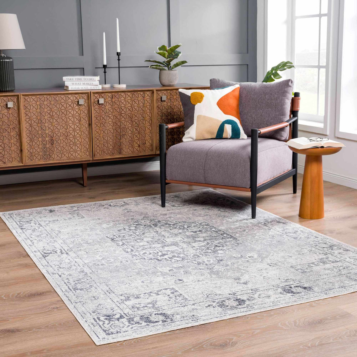 Gray flat pile washable rug by Boutique Rugs, styled in a modern living room setting with furniture and decor.