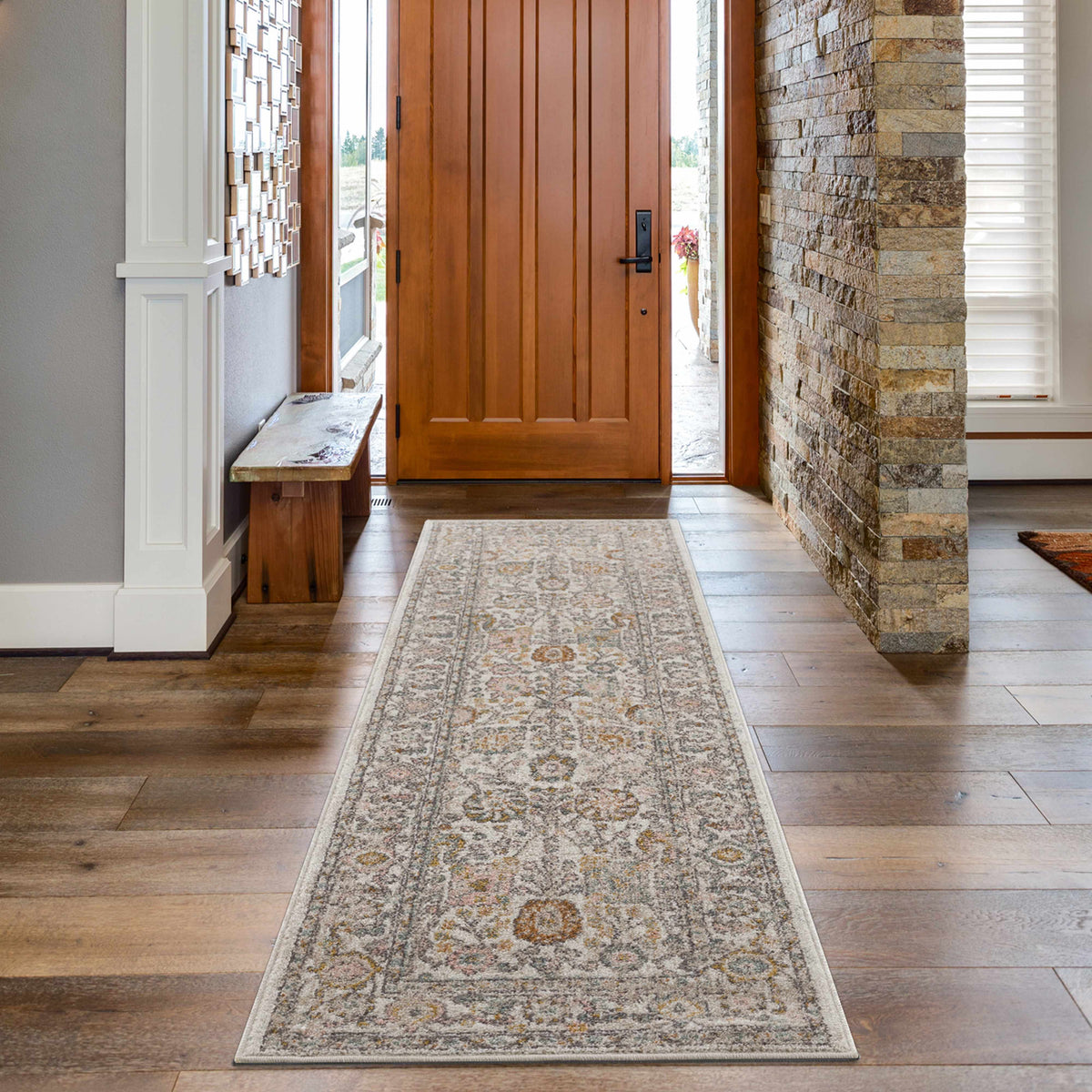 Herstmonceux Area Rug by Boutique Rugs displayed in a cozy living room setting with neutral tones and soft textures.