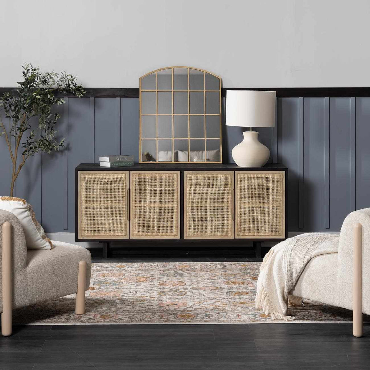 Herstmonceux area rug by Boutique Rugs displayed in a cozy living room setting with furniture and decorative accents.