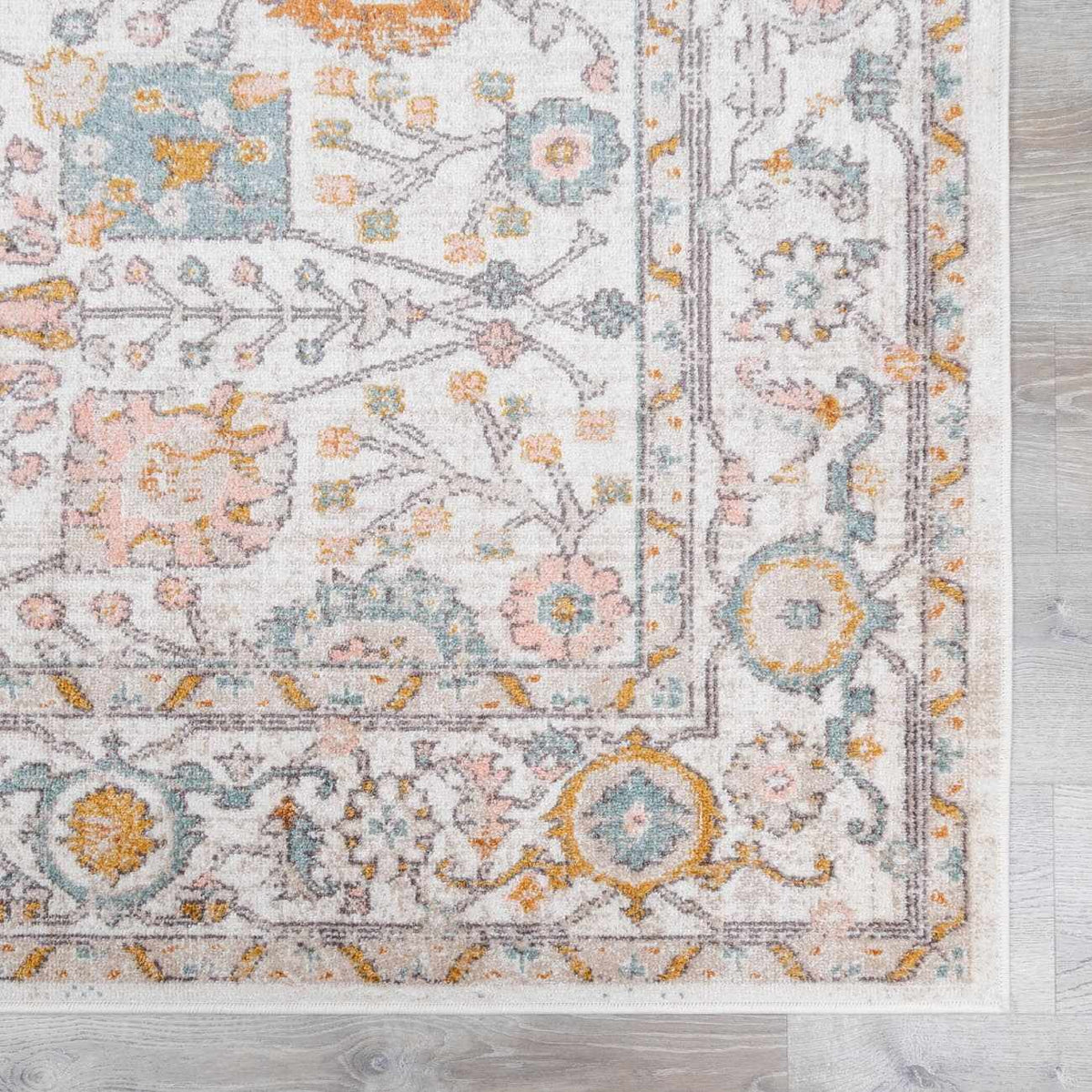Herstmonceux Area Rug by Boutique Rugs featuring a colorful geometric pattern and soft texture in a close-up view.