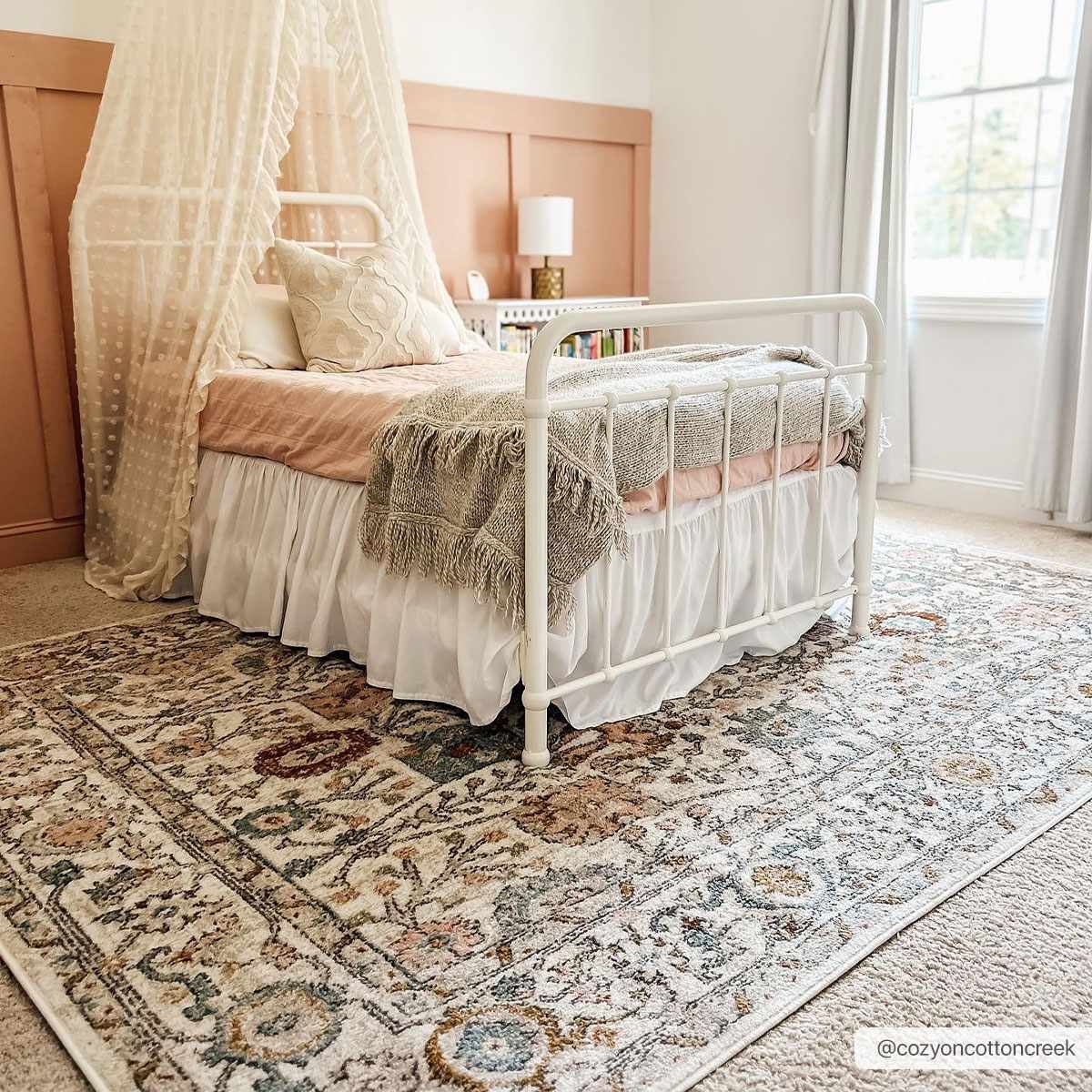 Herstmonceux area rug by Boutique Rugs, featuring a 6x9 size with a traditional design in neutral tones.