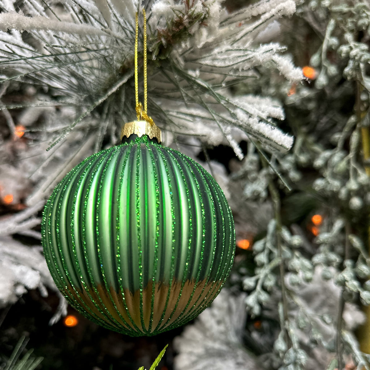 Green glitter ribbed glass Christmas ornament with gold bottom, 3.5-inch holiday decor from Shop Holly J Home.