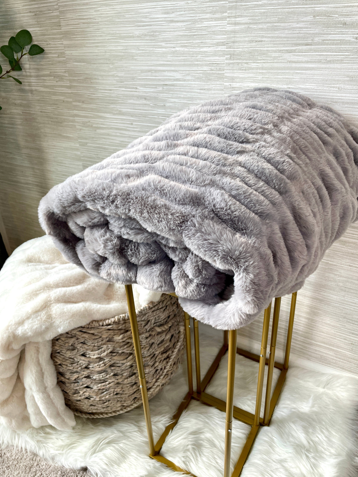 Gray faux fur blanket by Cloud9, 30x40 inch lap size with soft, plush texture perfect for cozying up.