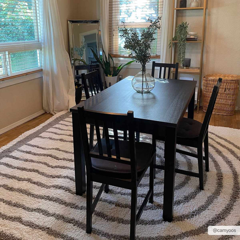 Taupe Jola area rug by Boutique Rugs, showcasing soft textured woven design in a spacious room setting.