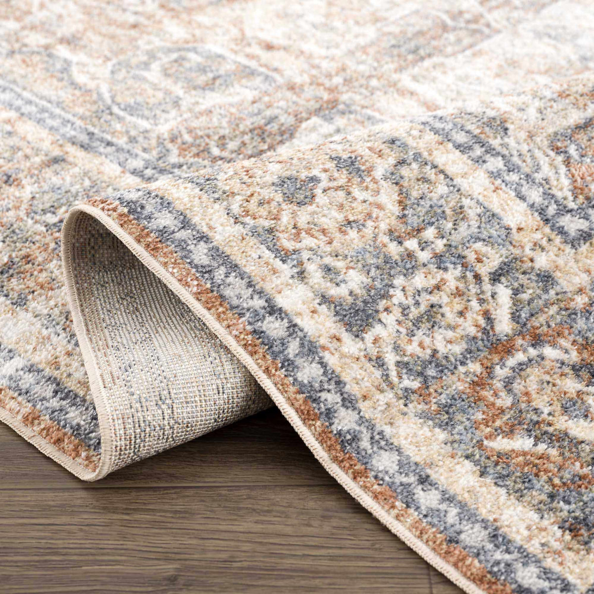 Blue Boutique Rugs washable rug folded showing soft texture and pattern, ideal for contemporary home decor.