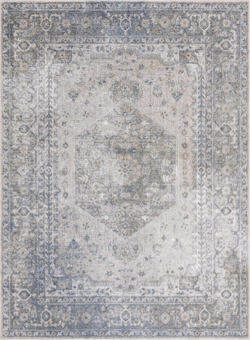 Blue Boutique Rugs washable rug with geometric design, displayed in a modern interior setting.