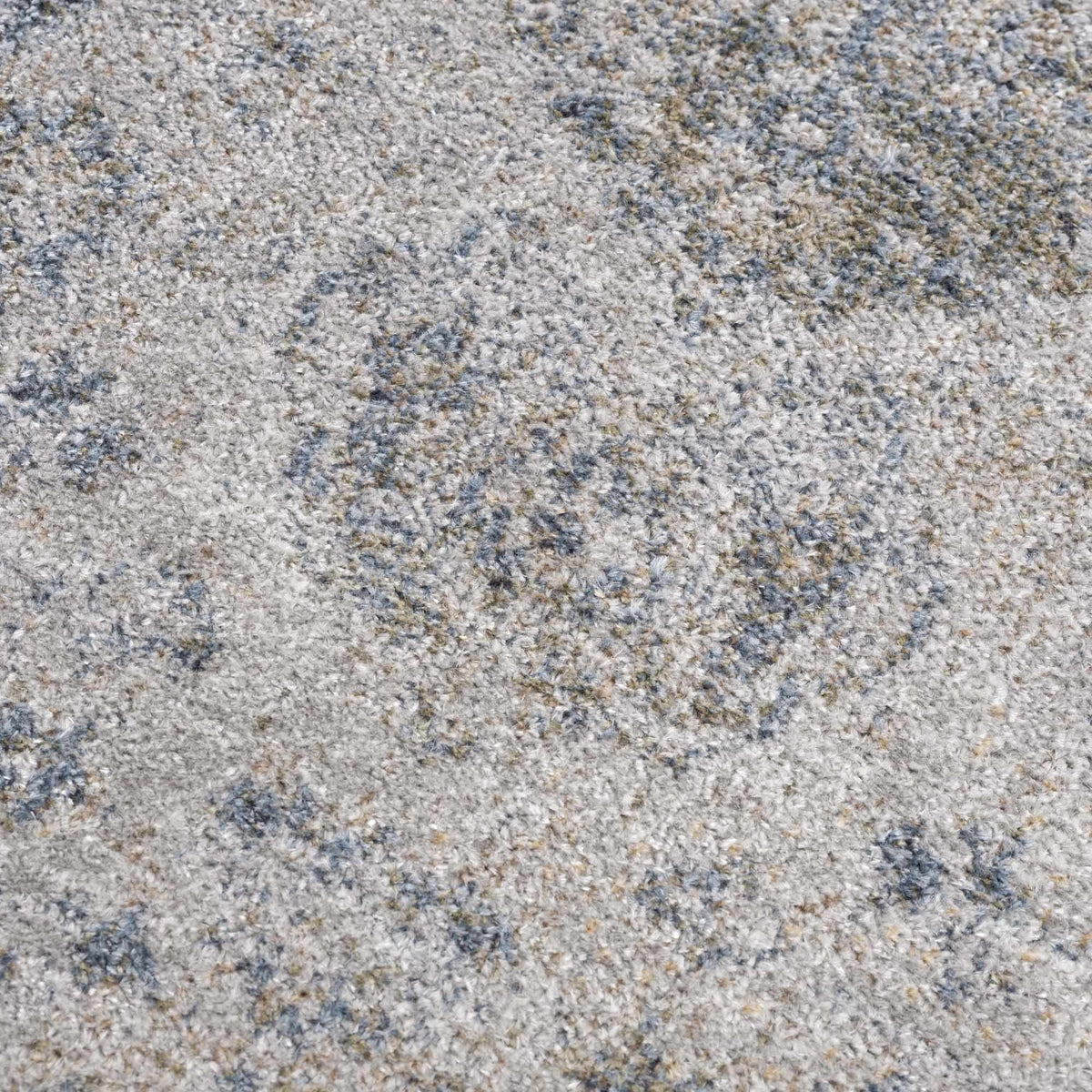 Blue washable rug from Boutique Rugs with textured surface, ideal for adding style and comfort to living spaces.