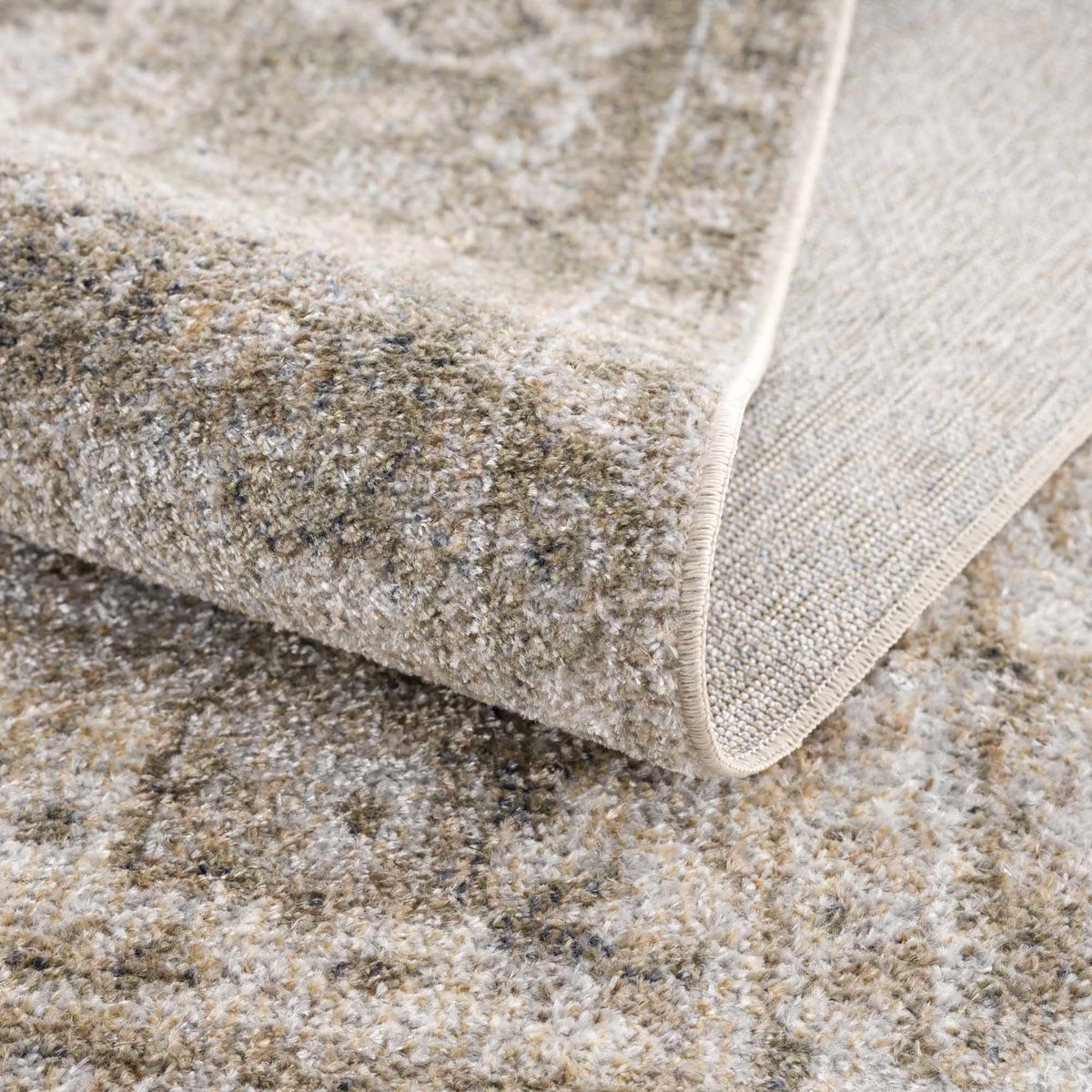 Folded Gael Boutique washable rug by Boutique Rugs, showcasing soft, durable fabric and stylish design for home decor.